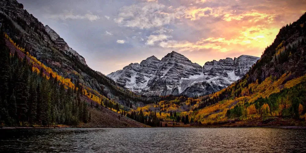 A Colorado landscape including a lake and mountains.