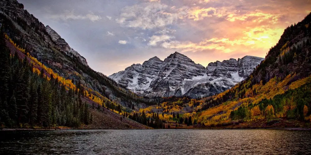 A Colorado landscape including a lake and mountains.