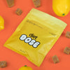 Diet Dose Amanita Gummies package featuring Amanita extract and THC, with a yellow background and lemon elements.