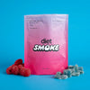 Diet Smoke Blue Raspberry Gummies packaging with gummies on a blue background