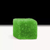Green gummy candy resembling cherry lime flavor