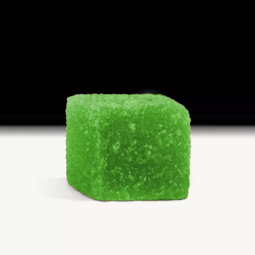 Green gummy candy resembling cherry lime flavor