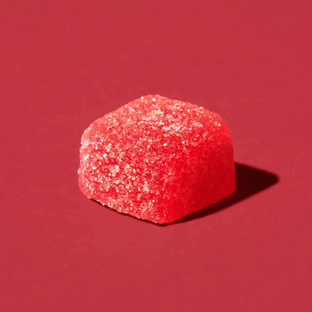 Cherry Bomb gummy candy on a red background